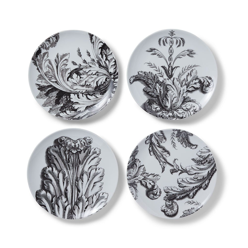 set of four black and white plates with Italian etched leaves